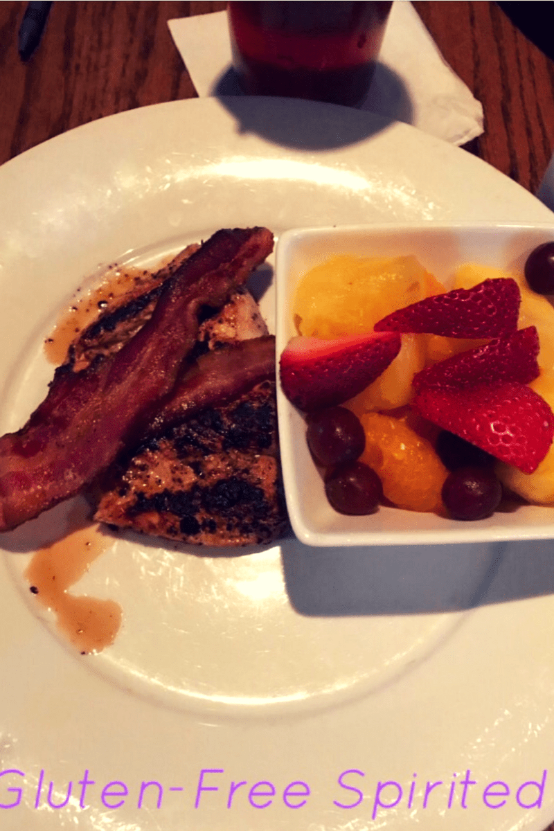 Grilled chicken sandwich with bacon and a side of fruit. #hickorytavern #glutenfree #soyfree #dairyfree #dietaryconscious