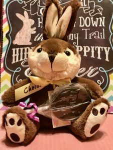 Chocolate Easter Egg shaped lollipop with stuffed bunny