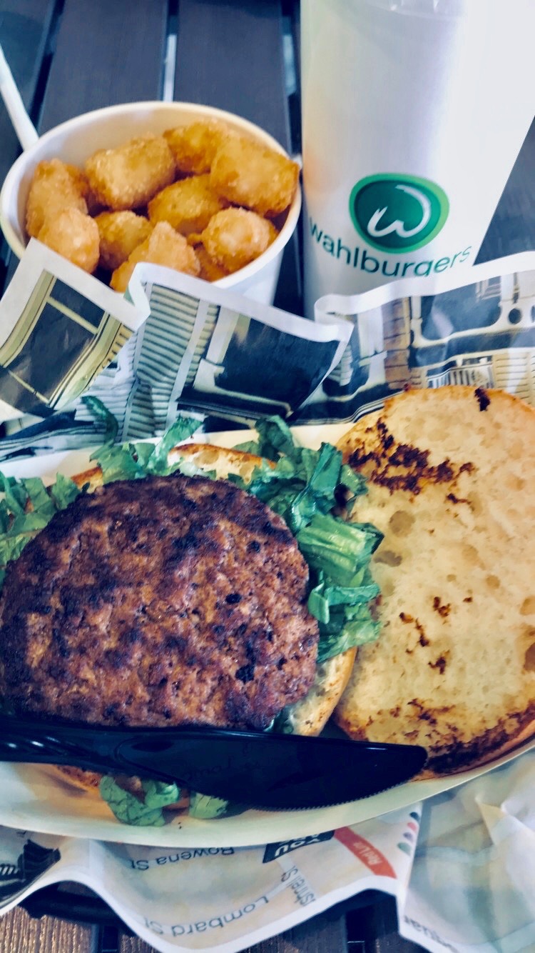 Wahlburgers hamburger and tater tots