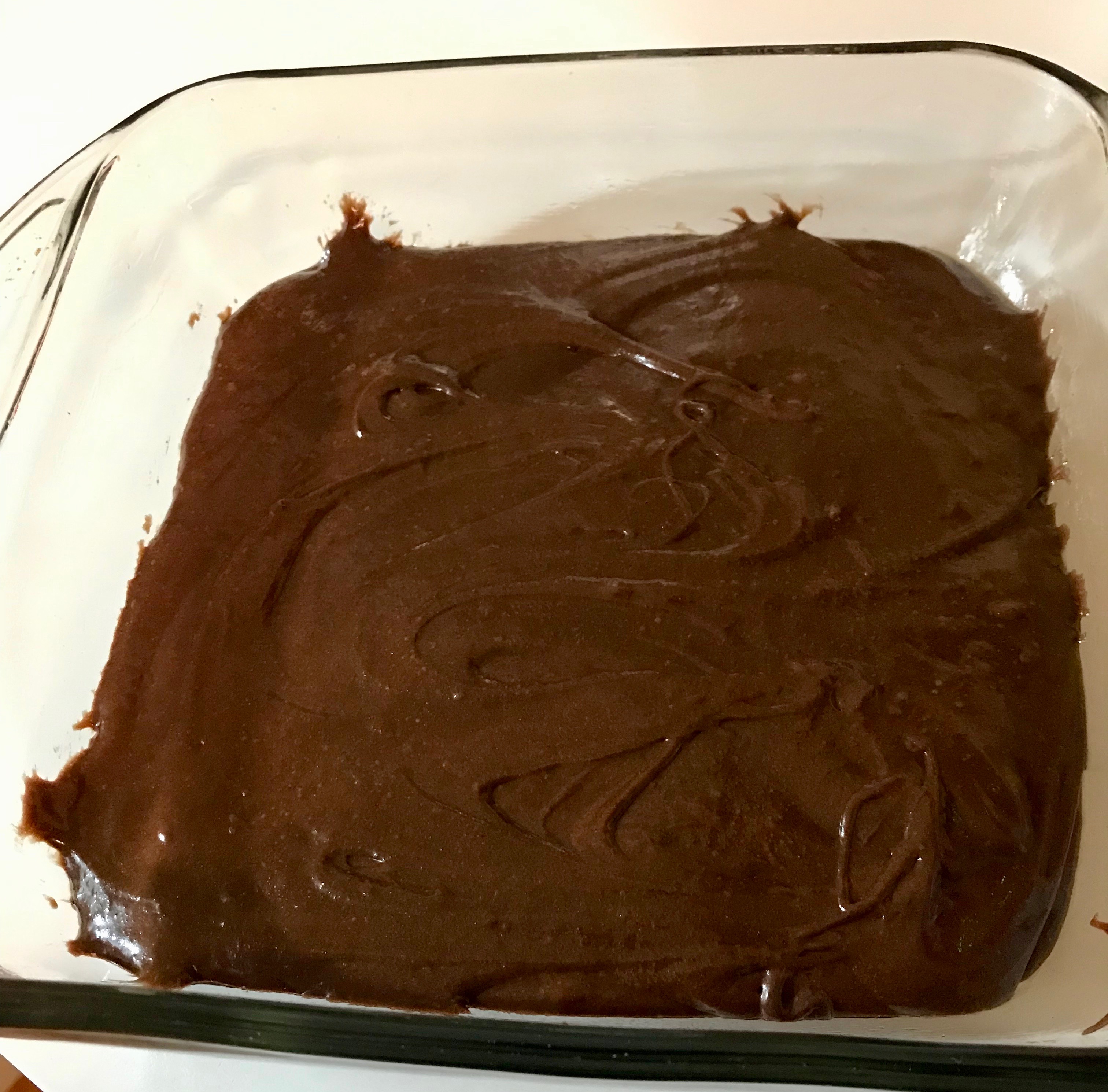 Brownie batter in pan