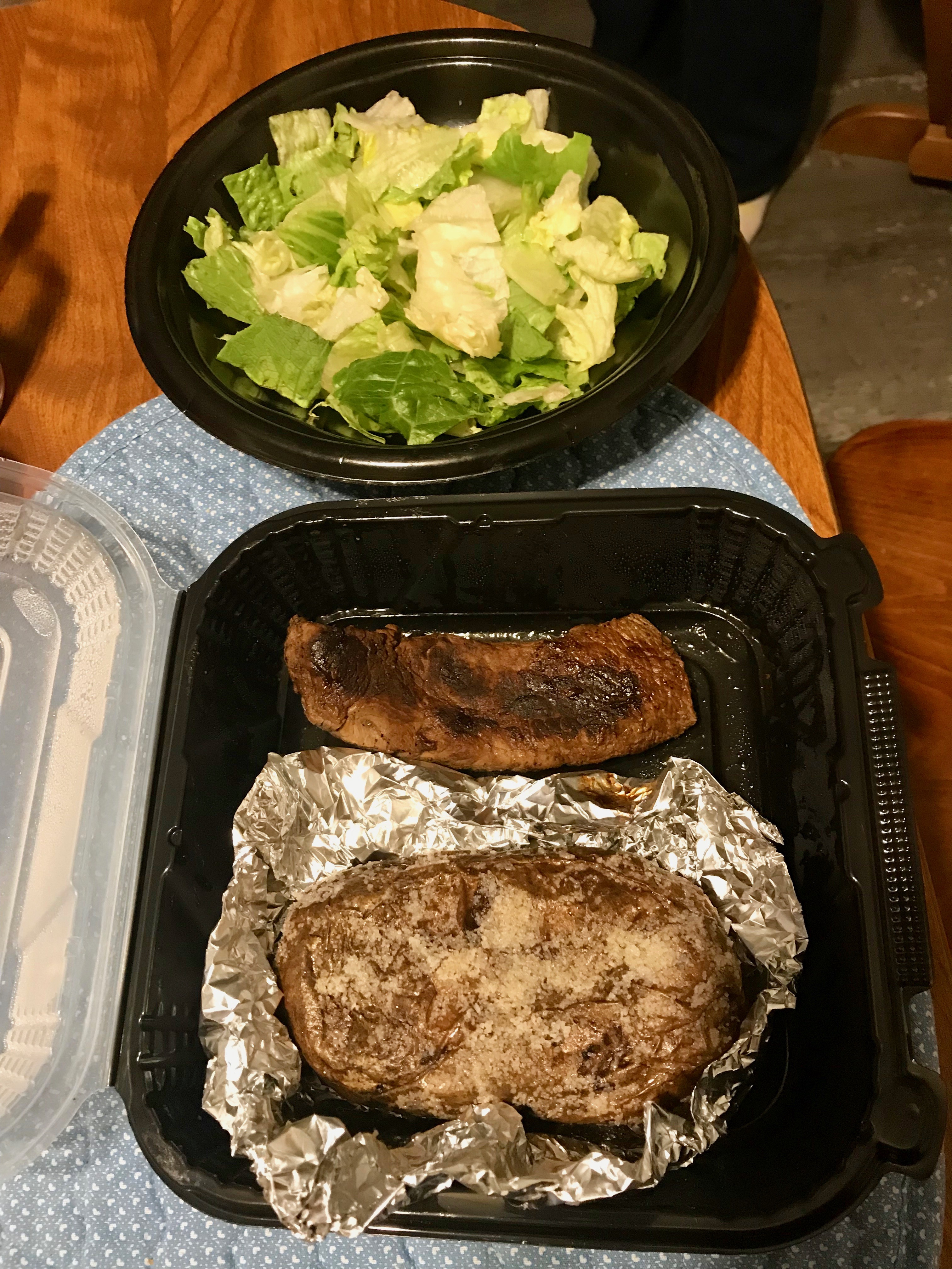 Outback steak, baked potato, & salad