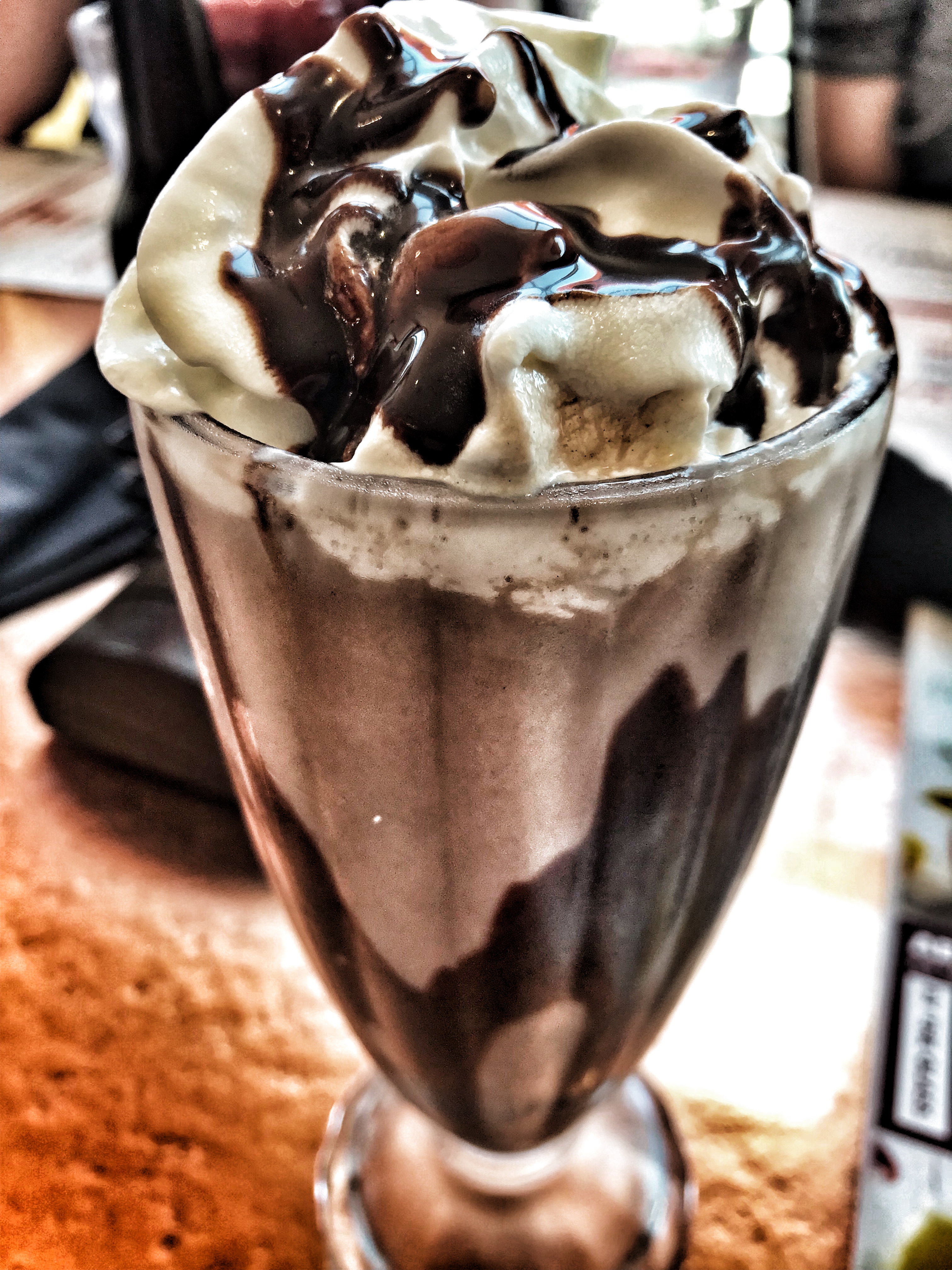 Chocolate milkshake topped with whipped cream