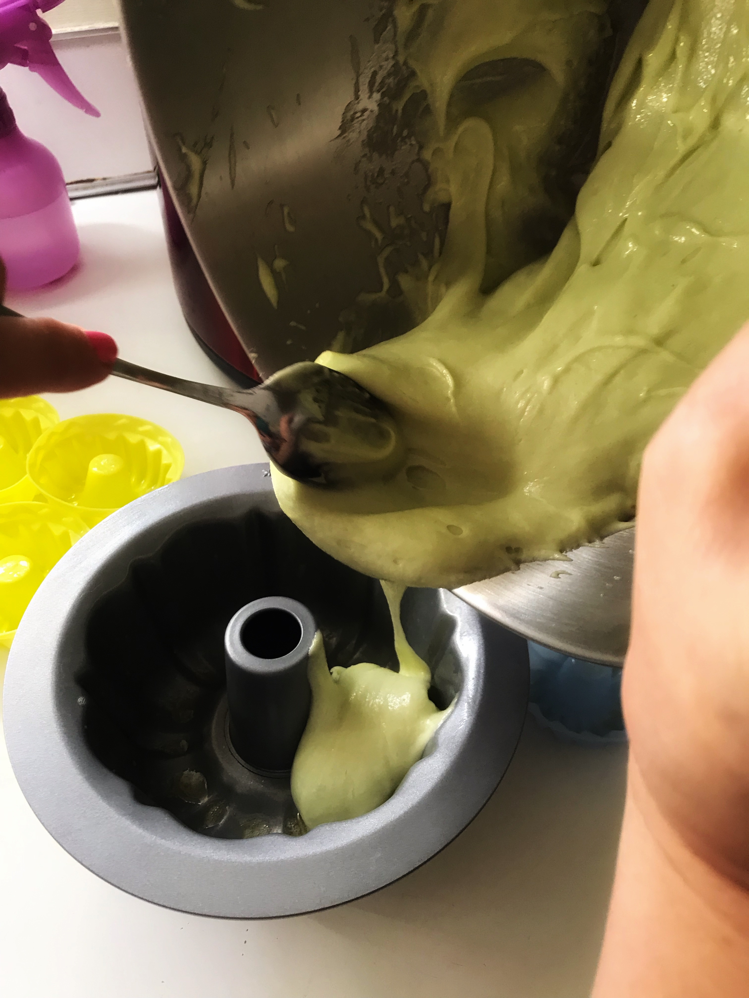 Pouring batter into bundt cake mold